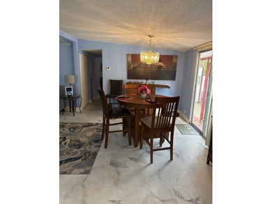 Discover Easy Coastal Living in Naples Land Yacht Harbor This