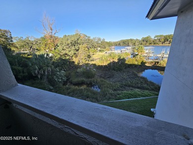 Welcome home to this beautiful two-story waterfront condo. The