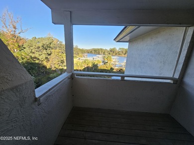 Welcome home to this beautiful two-story waterfront condo. The