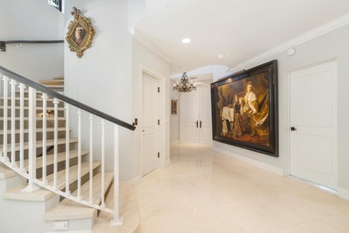 This Italianate 3 bedroom, 3.5 bath townhome offers over 4,100