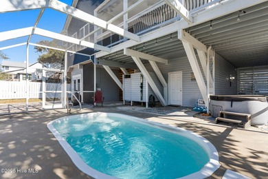 Welcome to 107 SE 71st Street, a coastal retreat nestled in the