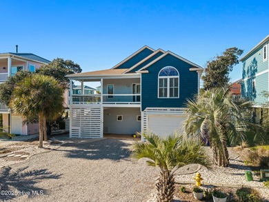 Welcome to 107 SE 71st Street, a coastal retreat nestled in the