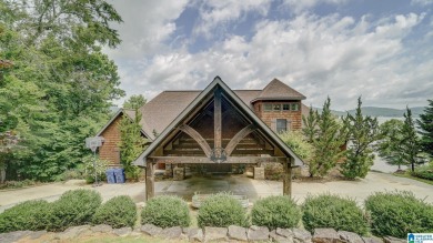 Experience the pinnacle of lakeside luxury at 268 Boulder Point