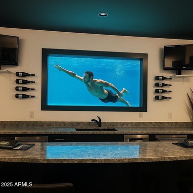 Experience everyday resort living in this iconic 1-acre gated