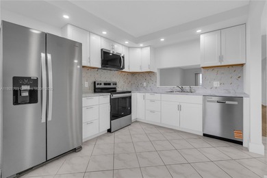 BEST LAKE VIEW & TASTEFULLY REMODELED!!! in Century Village