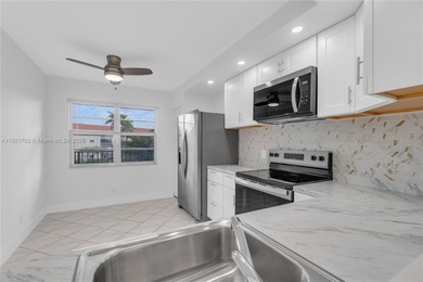 BEST LAKE VIEW & TASTEFULLY REMODELED!!! in Century Village