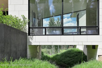 Experience the pinnacle of mountain modern living in this