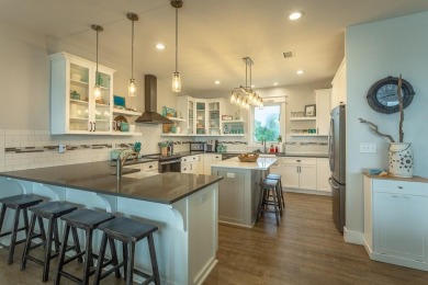 Welcome to your private coastal retreat--this custom-built