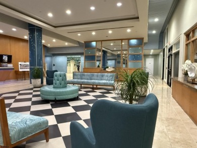 Spacious 1 bedroom, 1.5 bath condo with some ocean and bay views