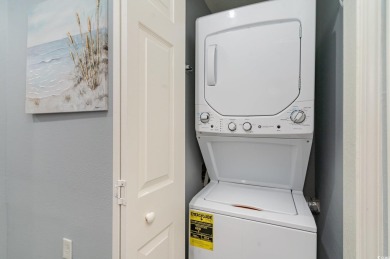 Experience coastal living at its finest in this immaculate