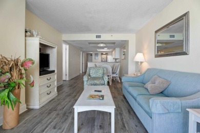 Discover coastal luxury in this beautifully updated two-bedroom