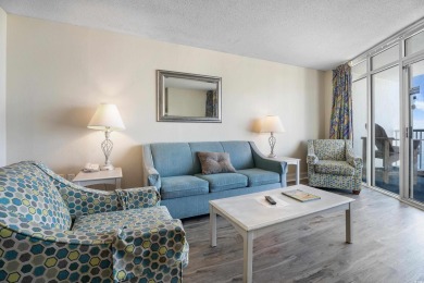 Discover coastal luxury in this beautifully updated two-bedroom