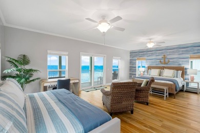 HIGHLIGHTS:  Beachfront beauty  Gorgeous Gulf views  3 levels