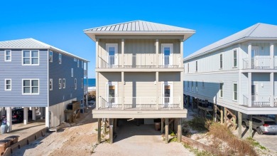 HIGHLIGHTS:  Beachfront beauty  Gorgeous Gulf views  3 levels