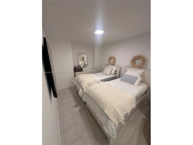 Direct ocean views from this fully renovated residence on the