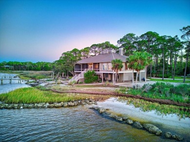 PRICE REDUCED!  Custom Built, BAY FRONT home with private dock
