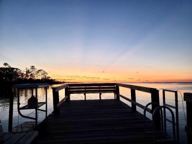 PRICE REDUCED!  Custom Built, BAY FRONT home with private dock