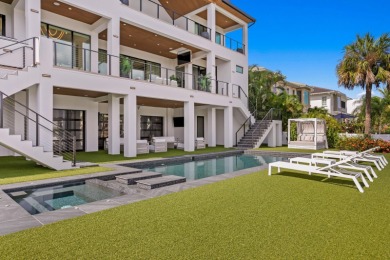 New Price! This breathtaking recently built gated waterfront