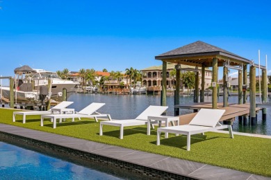 New Price! This breathtaking recently built gated waterfront