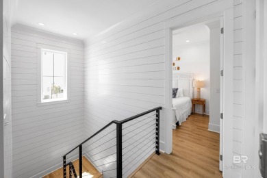 This fully furnished luxury home in a new waterfront community