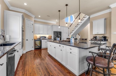 Beautifully renovated 5BR/5.5BA first tier home delivers the