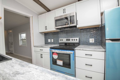 Lake Community!! Completely remodeled and move-in ready! This