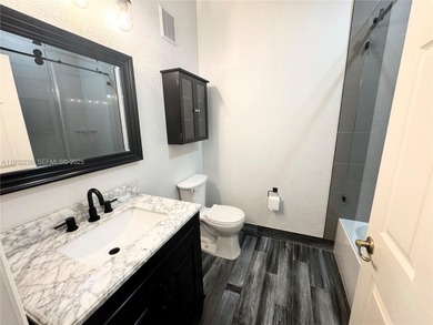 Beautifully updated 4 bedroom 2.5 bath home featuring brand new