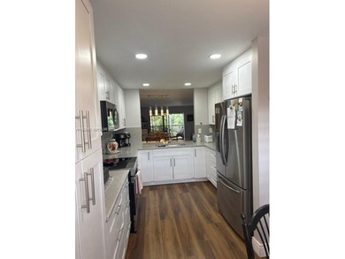 Beautifully updated 2-bedroom, 2-bath corner unit located in the