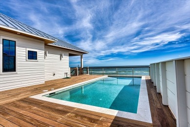 This new construction, six-bedroom, six-bathroom Gulf-front home