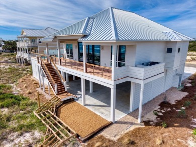 This new construction, six-bedroom, six-bathroom Gulf-front home