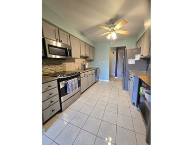 Spacious one-bedroom condo in the desirable Raintree subdivision