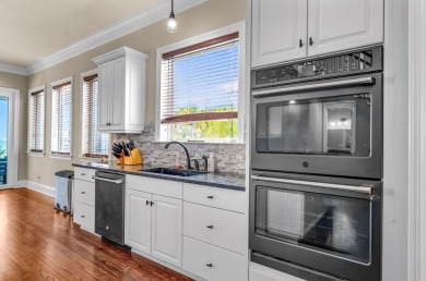 Beautifully renovated 5BR/5.5BA first tier home delivers the