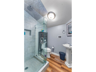 Beautifully renovated 5BR/5.5BA first tier home delivers the