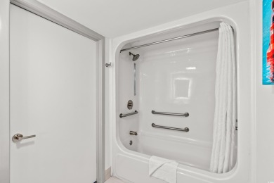 Experience luxury coastal living in this fully renovated