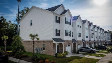 Discover this beautifully appointed three-story townhome