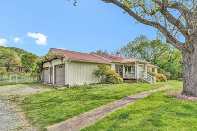 ** This homestead is hidden right off the main road & has so