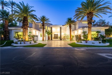 WELCOME TO THIS NEARLY 12,000sqft CUSTOM HOME WITHIN THE GUARD