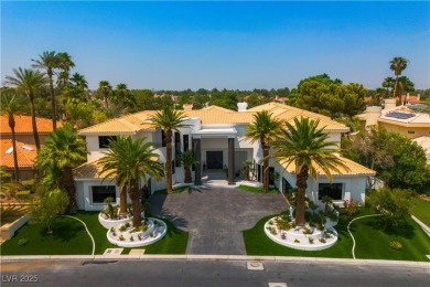 WELCOME TO THIS NEARLY 12,000sqft CUSTOM HOME WITHIN THE GUARD