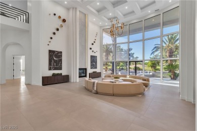 WELCOME TO THIS NEARLY 12,000sqft CUSTOM HOME WITHIN THE GUARD