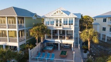Discover paradise in the custom-built, Gulf-front estate nestled