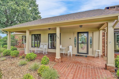 Discover a rare riverside haven: a sprawling 4-bedroom, 4-bath