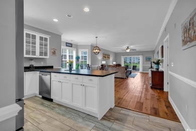 This furnished 3-bedroom, 2-bath condo offers beach living at