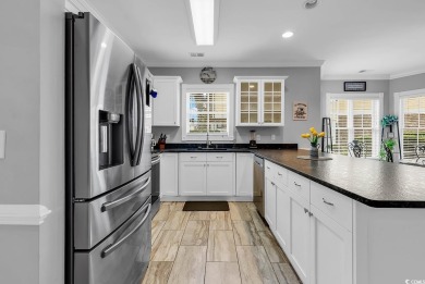 This furnished 3-bedroom, 2-bath condo offers beach living at