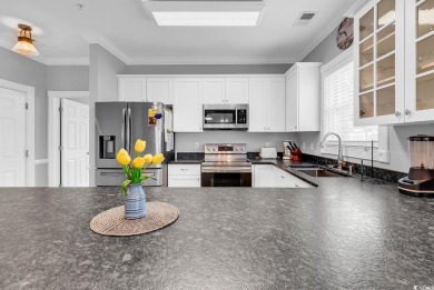 This furnished 3-bedroom, 2-bath condo offers beach living at