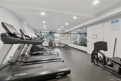 Just 1 block from the beach, this beautifully updated and