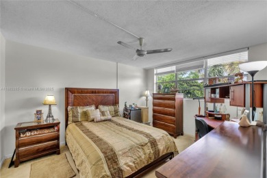 Welcome to Deerfield Beach Gardens! This 3rd-floor, beautifully