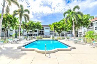 Welcome to Deerfield Beach Gardens! This 3rd-floor, beautifully