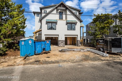 Welcome to coastal luxury redefined at 17 Lange Avenue in the