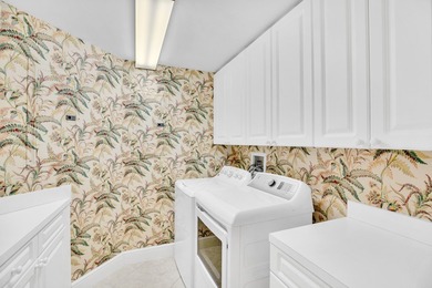 Fabulous private elevator entry residence in sought after