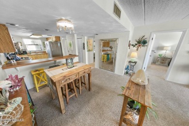 TOP FLOOR!! This 2BR/2BA CONDO boasts AWESOME OCEAN & RIVER